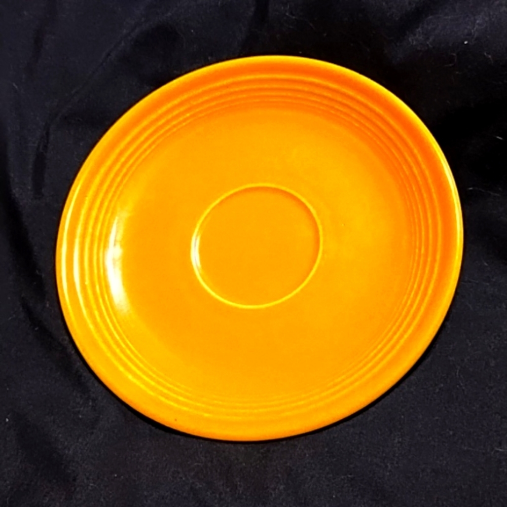 Fiestaware saucer in yellow (older) color